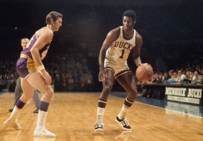 Milwaukee Bucks guard Oscar Robertson (1) against Los Angeles Lakers guard Jerry West (44)